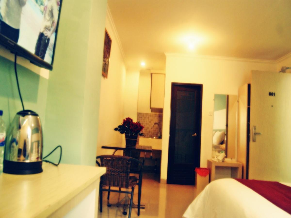 Leos Hotel Tomohon Extérieur photo